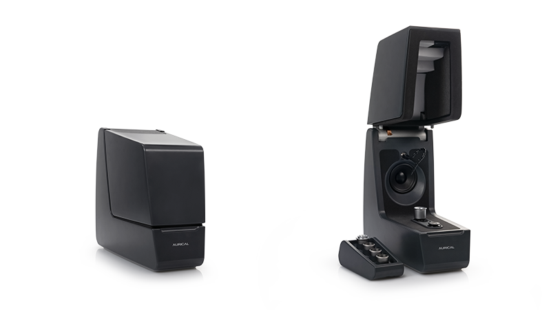 Aurical IQ HIT hearing instrument test box shown closed and open for hearing aid verification.