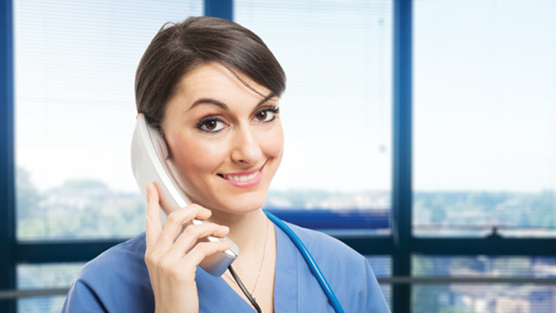 Healthcare staff member providing support for newborn screening data management remotely.