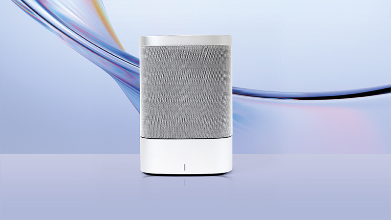 Otometrics Measure free-field loudspeaker with a modern silver mesh design, showcased on a sleek gradient background representing sound precision.